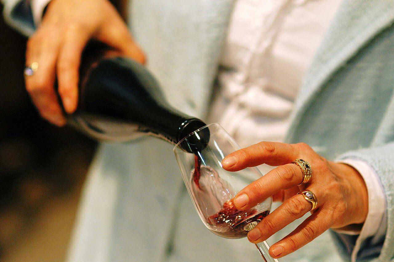 Red wine being poured into a glass (stock photo, not at the Icehouse)